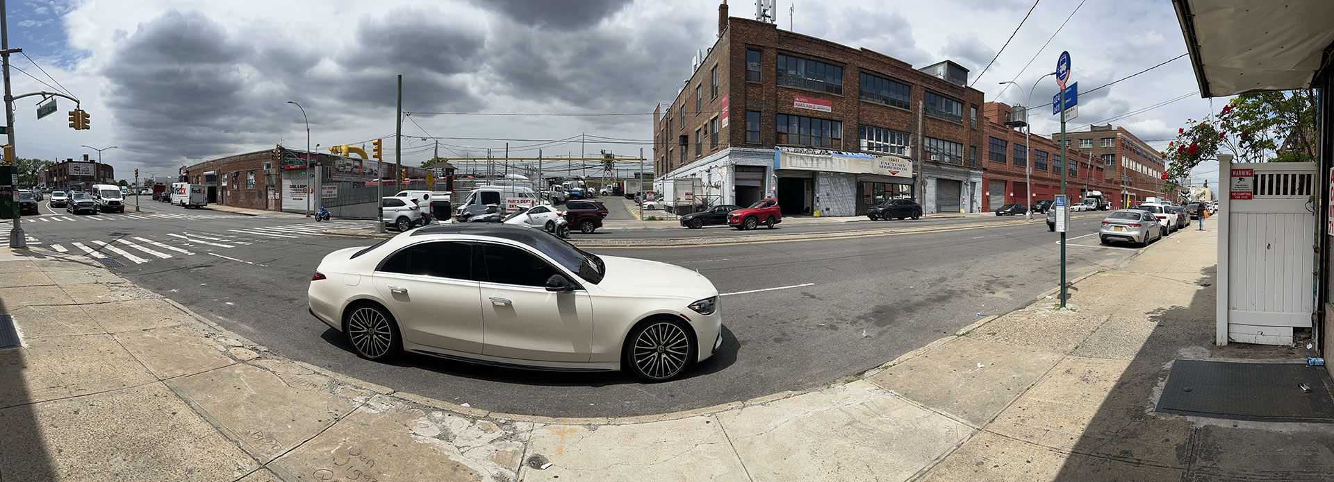 Panorama of vehicles like cars on a road
